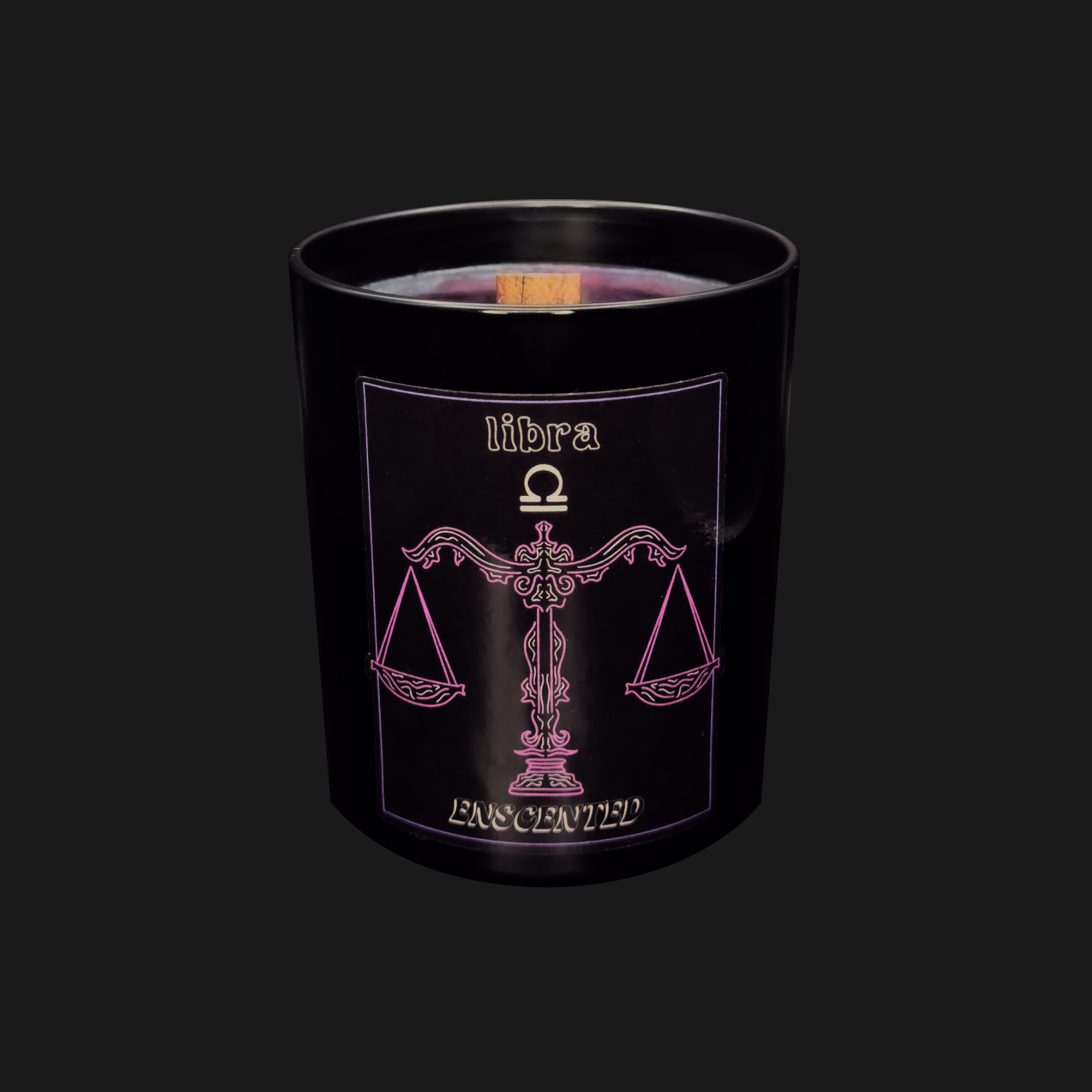 A black scented candle with a purple label featuring the Libra zodiac sign symbol in pink. The candle is named 'LIBRA' and the label includes the phrase 'EMPOWERED'.